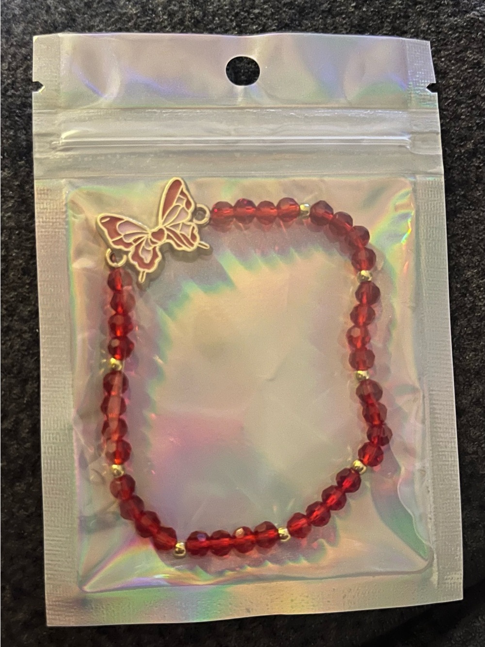 Red Beaded Bracelet with Gold Butterfly Charm